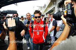 Fernando Alonso (ESP) Ferrari arrives at the circuit. 25.11.2012. Formula 1 World Championship, Rd 20, Brazilian Grand Prix, Sao Paulo, Brazil, Race Day.