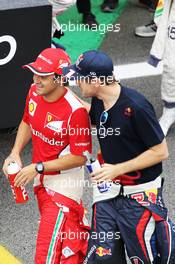 (L to R): Felipe Massa (BRA) Ferrari and Sebastian Vettel (GER) Red Bull Racing on the drivers parade. 25.11.2012. Formula 1 World Championship, Rd 20, Brazilian Grand Prix, Sao Paulo, Brazil, Race Day.