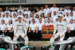 (L to R): Michael Schumacher (GER) Mercedes AMG F1 and Nico Rosberg (GER) Mercedes AMG F1 at a team photograph. 25.11.2012. Formula 1 World Championship, Rd 20, Brazilian Grand Prix, Sao Paulo, Brazil, Race Day.