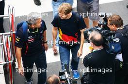 Sebastian Vettel (GER) Red Bull Racing arrives at the circuit. 25.11.2012. Formula 1 World Championship, Rd 20, Brazilian Grand Prix, Sao Paulo, Brazil, Race Day.