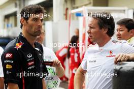 (L to R): Mark Webber (AUS) Red Bull Racing with Sam Michael (AUS) McLaren Sporting Director. 25.11.2012. Formula 1 World Championship, Rd 20, Brazilian Grand Prix, Sao Paulo, Brazil, Race Day.