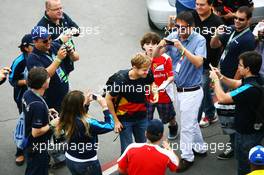 Sebastian Vettel (GER) Red Bull Racing arrives at the circuit. 25.11.2012. Formula 1 World Championship, Rd 20, Brazilian Grand Prix, Sao Paulo, Brazil, Race Day.