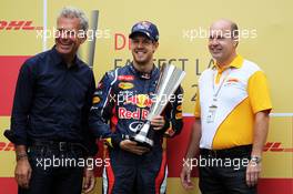 Sebastian Vettel (GER) Red Bull Racing receives his DHL fastest lap award. 25.11.2012. Formula 1 World Championship, Rd 20, Brazilian Grand Prix, Sao Paulo, Brazil, Race Day.