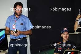 Matteo Bonciani (ITA) FIA Media Delegate and Sebastian Vettel (GER) Red Bull Racing in the FIA Press Conference. 22.11.2012. Formula 1 World Championship, Rd 20, Brazilian Grand Prix, Sao Paulo, Brazil, Preparation Day.