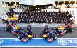 (L to R): Mark Webber (AUS) Red Bull Racing and team mate Sebastian Vettel (GER) Red Bull Racing at a team photograph. 22.11.2012. Formula 1 World Championship, Rd 20, Brazilian Grand Prix, Sao Paulo, Brazil, Preparation Day.
