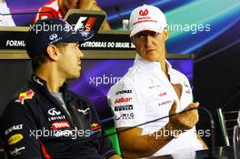 (L to R): Sebastian Vettel (GER) Red Bull Racing and Michael Schumacher (GER) Mercedes AMG F1 in the FIA Press Conference. 22.11.2012. Formula 1 World Championship, Rd 20, Brazilian Grand Prix, Sao Paulo, Brazil, Preparation Day.