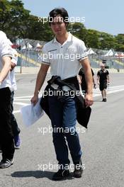 Ma Qing Hua (CHN) Hispania Racing F1 Team (HRT) Test Driver walks the circuit. 22.11.2012. Formula 1 World Championship, Rd 20, Brazilian Grand Prix, Sao Paulo, Brazil, Preparation Day.