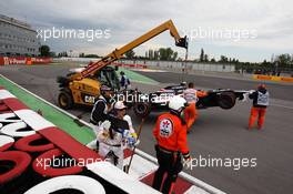 The Williams FW34 of Bruno Senna (BRA) Williams is recovered after he crashed at the Champions' Wall in the second practice session. 08.06.2012. Formula 1 World Championship, Rd 7, Canadian Grand Prix, Montreal, Canada, Practice Day