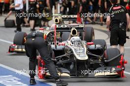 Kimi Raikkonen (FIN) Lotus F1 E20 and Romain Grosjean (FRA) Lotus F1 E20 in the pits. 08.06.2012. Formula 1 World Championship, Rd 7, Canadian Grand Prix, Montreal, Canada, Practice Day