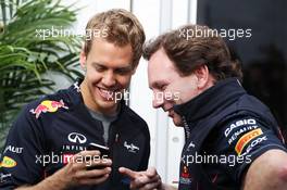 (L to R): Sebastian Vettel (GER) Red Bull Racing with Christian Horner (GBR) Red Bull Racing Team Principal. 08.06.2012. Formula 1 World Championship, Rd 7, Canadian Grand Prix, Montreal, Canada, Practice Day