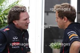 (L to R): Christian Horner (GBR) Red Bull Racing Team Principal with Sebastian Vettel (GER) Red Bull Racing. 08.06.2012. Formula 1 World Championship, Rd 7, Canadian Grand Prix, Montreal, Canada, Practice Day