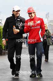 (L to R): Pedro De La Rosa (ESP) HRT Formula 1 Team with Fernando Alonso (ESP) Ferrari. 08.06.2012. Formula 1 World Championship, Rd 7, Canadian Grand Prix, Montreal, Canada, Practice Day
