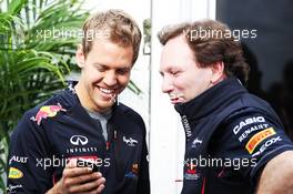 (L to R): Sebastian Vettel (GER) Red Bull Racing with Christian Horner (GBR) Red Bull Racing Team Principal. 08.06.2012. Formula 1 World Championship, Rd 7, Canadian Grand Prix, Montreal, Canada, Practice Day