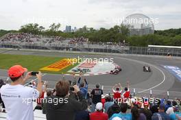 Lewis Hamilton (GBR) McLaren MP4/27 waves to the fans. 08.06.2012. Formula 1 World Championship, Rd 7, Canadian Grand Prix, Montreal, Canada, Practice Day