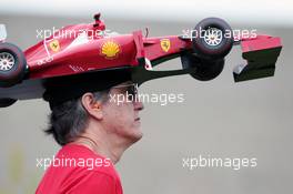 Ferrari fan with a car on his head. 08.06.2012. Formula 1 World Championship, Rd 7, Canadian Grand Prix, Montreal, Canada, Practice Day