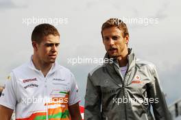 (L to R): Paul di Resta (GBR) Sahara Force India F1 with Jenson Button (GBR) McLaren. 08.06.2012. Formula 1 World Championship, Rd 7, Canadian Grand Prix, Montreal, Canada, Practice Day