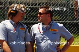 Paul Hembery (GBR) Pirelli Motorsport Director (Right). 10.06.2012. Formula 1 World Championship, Rd 7, Canadian Grand Prix, Montreal, Canada, Race Day