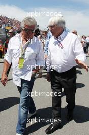 (L to R): Mario Andretti (USA) with Bernie Ecclestone (GBR) CEO Formula One Group (FOM) on the grid. 10.06.2012. Formula 1 World Championship, Rd 7, Canadian Grand Prix, Montreal, Canada, Race Day
