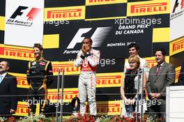 The podium (L to R): Romain Grosjean (FRA) Lotus F1 Team, second; Lewis Hamilton (GBR) McLaren, race winner; Sergio Perez (MEX) Sauber, third. 10.06.2012. Formula 1 World Championship, Rd 7, Canadian Grand Prix, Montreal, Canada, Race Day