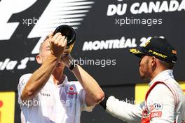 Race winner Lewis Hamilton (GBR) McLaren celebrates on the podium with Martin Whitmarsh (GBR) McLaren Chief Executive Officer. 10.06.2012. Formula 1 World Championship, Rd 7, Canadian Grand Prix, Montreal, Canada, Race Day