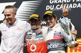 The podium (L to R): Martin Whitmarsh (GBR) McLaren Chief Executive Officer; Lewis Hamilton (GBR) McLaren, race winner; Sergio Perez (MEX) Sauber, third. 10.06.2012. Formula 1 World Championship, Rd 7, Canadian Grand Prix, Montreal, Canada, Race Day