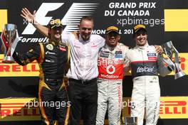 Romain Grosjean (FRA), Lotus F1 Team, Lewis Hamilton (GBR), McLaren Mercedes and Sergio Perez (MEX), Sauber F1 Team  10.06.2012. Formula 1 World Championship, Rd 7, Canadian Grand Prix, Montreal, Canada, Race Day