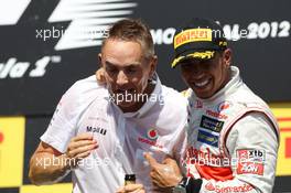 Race winner Lewis Hamilton (GBR) McLaren celebrates on the podium with Martin Whitmarsh (GBR) McLaren Chief Executive Officer. 10.06.2012. Formula 1 World Championship, Rd 7, Canadian Grand Prix, Montreal, Canada, Race Day