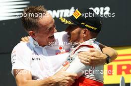 Race winner Lewis Hamilton (GBR) McLaren celebrates on the podium with Martin Whitmarsh (GBR) McLaren Chief Executive Officer. 10.06.2012. Formula 1 World Championship, Rd 7, Canadian Grand Prix, Montreal, Canada, Race Day