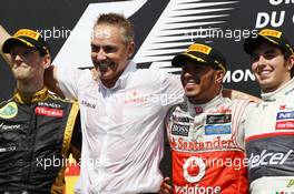 The podium (L to R): Romain Grosjean (FRA) Lotus F1 Team, second; Martin Whitmarsh (GBR) McLaren Chief Executive Officer; Lewis Hamilton (GBR) McLaren, race winner; Sergio Perez (MEX) Sauber, third. 10.06.2012. Formula 1 World Championship, Rd 7, Canadian Grand Prix, Montreal, Canada, Race Day