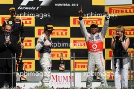 Romain Grosjean (FRA), Lotus F1 Team, Lewis Hamilton (GBR), McLaren Mercedes and Sergio Perez (MEX), Sauber F1 Team  10.06.2012. Formula 1 World Championship, Rd 7, Canadian Grand Prix, Montreal, Canada, Race Day