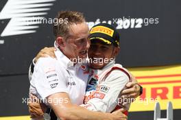 Race winner Lewis Hamilton (GBR) McLaren celebrates on the podium with Martin Whitmarsh (GBR) McLaren Chief Executive Officer. 10.06.2012. Formula 1 World Championship, Rd 7, Canadian Grand Prix, Montreal, Canada, Race Day