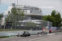 Vitaly Petrov (RUS) Caterham CT01 leads Jean-Eric Vergne (FRA) Scuderia Toro Rosso STR7. 10.06.2012. Formula 1 World Championship, Rd 7, Canadian Grand Prix, Montreal, Canada, Race Day
