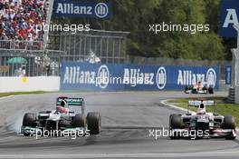 (L to R): Michael Schumacher (GER) Mercedes AMG F1 W03 and Kamui Kobayashi (JPN) Sauber C31 battle for position. 10.06.2012. Formula 1 World Championship, Rd 7, Canadian Grand Prix, Montreal, Canada, Race Day