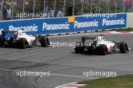 Sergio Perez (MEX) Sauber C31 and team mate Kamui Kobayashi (JPN) Sauber C31 (Right) battle for position. 10.06.2012. Formula 1 World Championship, Rd 7, Canadian Grand Prix, Montreal, Canada, Race Day