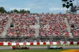 Nico Rosberg (GER), Mercedes GP and Romain Grosjean (FRA), Lotus F1 Team  10.06.2012. Formula 1 World Championship, Rd 7, Canadian Grand Prix, Montreal, Canada, Race Day