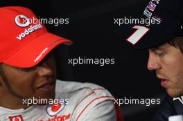 (L to R): Lewis Hamilton (GBR) McLaren with pole sitter Sebastian Vettel (GER) Red Bull Racing in the FIA Press Conference. 09.06.2012. Formula 1 World Championship, Rd 7, Canadian Grand Prix, Montreal, Canada, Qualifying Day