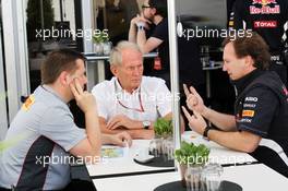 (L to R): Paul Hembery (GBR) Pirelli Motorsport Director with Dr Helmut Marko (AUT) Red Bull Motorsport Consultant and Christian Horner (GBR) Red Bull Racing Team Principal. 09.06.2012. Formula 1 World Championship, Rd 7, Canadian Grand Prix, Montreal, Canada, Qualifying Day