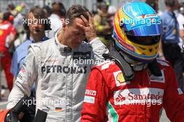 Michael Schumacher (GER), Mercedes AMG Petronas and Fernando Alonso (ESP), Scuderia Ferrari  09.06.2012. Formula 1 World Championship, Rd 7, Canadian Grand Prix, Montreal, Canada, Qualifying Day