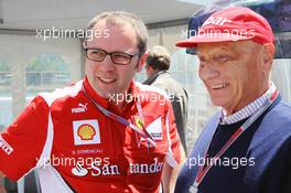 (L to R): Stefano Domenicali (ITA) Ferrari General Director with Niki Lauda (AUT). 09.06.2012. Formula 1 World Championship, Rd 7, Canadian Grand Prix, Montreal, Canada, Qualifying Day