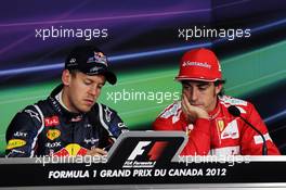 (L to R): pole sitter Sebastian Vettel (GER) Red Bull Racing and Fernando Alonso (ESP) Ferrari in the FIA Press Conference. 09.06.2012. Formula 1 World Championship, Rd 7, Canadian Grand Prix, Montreal, Canada, Qualifying Day