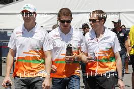 (L to R): Nico Hulkenberg (GER) Sahara Force India F1 with team mate Paul di Resta (GBR) Sahara Force India F1 and Will Hings (GBR) Sahara Force India F1 Press Officer. 10.06.2012. Formula 1 World Championship, Rd 7, Canadian Grand Prix, Montreal, Canada, Race Day