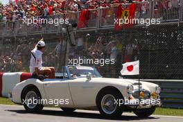 Kamui Kobayashi (JPN) Sauber on the drivers parade. 10.06.2012. Formula 1 World Championship, Rd 7, Canadian Grand Prix, Montreal, Canada, Race Day