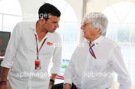 (L to R): Will Buxton (GBR) Speed TV Presenter with Bernie Ecclestone (GBR) CEO Formula One Group (FOM). 10.06.2012. Formula 1 World Championship, Rd 7, Canadian Grand Prix, Montreal, Canada, Race Day