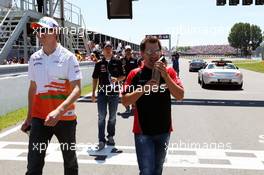 (L to R): Nico Hulkenberg (GER) Sahara Force India F1 with Timo Glock (GER) Marussia F1 Team on the drivers parade. 10.06.2012. Formula 1 World Championship, Rd 7, Canadian Grand Prix, Montreal, Canada, Race Day