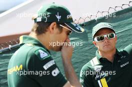 (L to R): Vitaly Petrov (RUS) Caterham with Heikki Kovalainen (FIN) Caterham. 10.06.2012. Formula 1 World Championship, Rd 7, Canadian Grand Prix, Montreal, Canada, Race Day