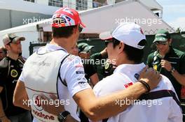 (L to R): Jenson Button (GBR) McLaren with Sergio Perez (MEX) Sauber. 10.06.2012. Formula 1 World Championship, Rd 7, Canadian Grand Prix, Montreal, Canada, Race Day