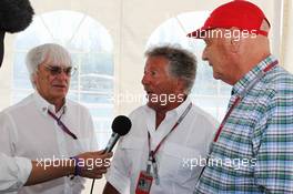 (L to R): Bernie Ecclestone (GBR) CEO Formula One Group (FOM) with Mario Andretti (USA) and Niki Lauda (AUT). 10.06.2012. Formula 1 World Championship, Rd 7, Canadian Grand Prix, Montreal, Canada, Race Day