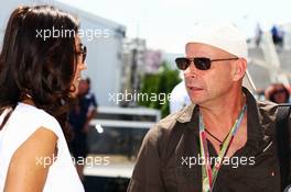 (L to R): Fabiana Flosi (BRA), fiance of Bernie Ecclestone (GBR) CEO Formula One Group (FOM), with Guy Liberte (CDN) Cirque de Soleil. 10.06.2012. Formula 1 World Championship, Rd 7, Canadian Grand Prix, Montreal, Canada, Race Day