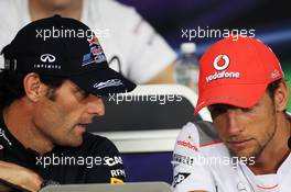 (L to R): Mark Webber (AUS) Red Bull Racing with Jenson Button (GBR) McLaren in the FIA Press Conference. 07.06.2012. Formula 1 World Championship, Rd 7, Canadian Grand Prix, Montreal, Canada, Preparation Day