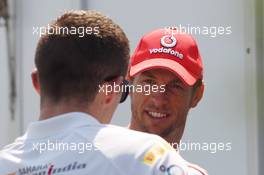 (L to R): Paul di Resta (GBR) Sahara Force India F1 with Jenson Button (GBR) McLaren. 07.06.2012. Formula 1 World Championship, Rd 7, Canadian Grand Prix, Montreal, Canada, Preparation Day